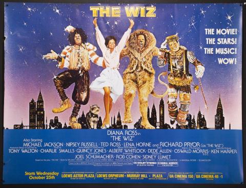 Movie poster for The Wiz featuring Dorothy, the Scarecrow, the Tin Man, and the Cowardly Lion in front of a city skyline