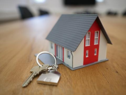 miniature new home and key