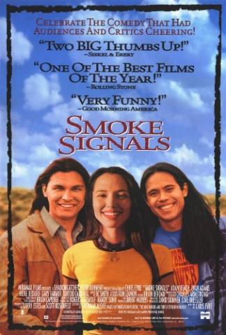 Movie poster for the 1998 film Smoke Signals, featuring three smiling Native American teens standing in front of a bright blue sky full of fluffy white clouds