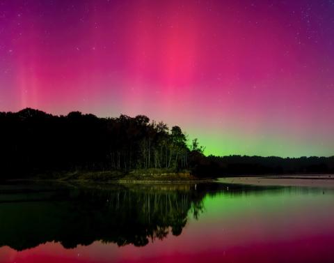 aurora lights over lake 