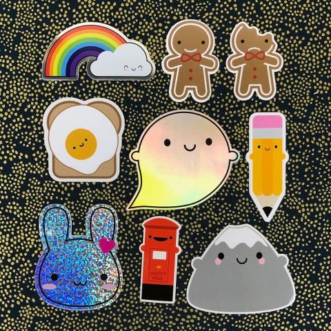 photo of 8 stickers, including a rainbow, gingerbread men, egg, ghost, pencil, bunny, 