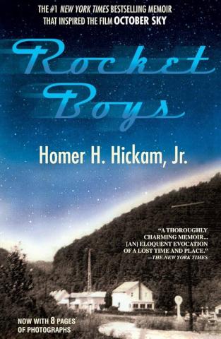 Cover for Homer Hickam's book, Rocket Boys. The cover depicts a building with a radio tower set against the backdrop of the forested mountains of West Virginia. A dark blue sky full of stars fills the upper two-thirds of the cover with the title in the upper third.